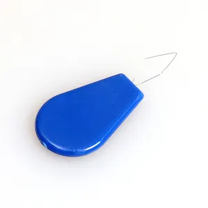Macro view of a blue plastic needle threader with a fine diamond-shaped wire loop