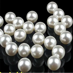 Detailed close-up view of white ABS imitation pearl round beads for jewelry making
