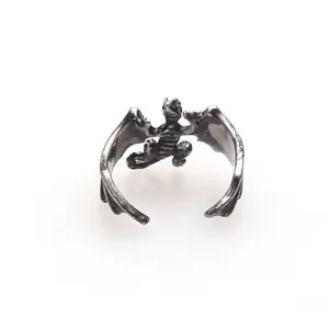 Retro punk style adjustable pterosaur ring with detailed dragon wings in antique finish