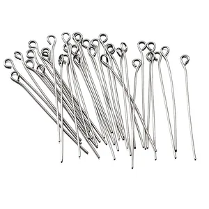 Macro view of silver metal eye pins for DIY jewelry making and handmade beading crafts