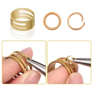 Detailed view of DIY jewelry jump ring tool being used with pliers to open rings