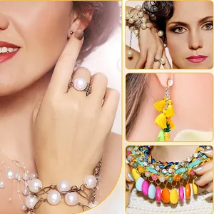 Detailed view of handmade jewelry collection featuring pearl bracelets and tassel earrings