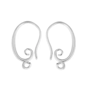 Detailed macro view of vintage style silver scroll ear hooks for DIY earring making projects