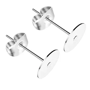 Pair of silver-tone flat pad earring posts with butterfly backs for DIY jewelry