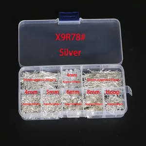 Detail view of DIY earring making kit with various silver findings in a clear storage box