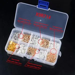 Detailed view of jewelry making kit with lobster clasps and bails in a storage box