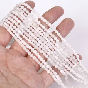 Close-up of 4mm faceted white moonstone rondelle beads for jewelry making