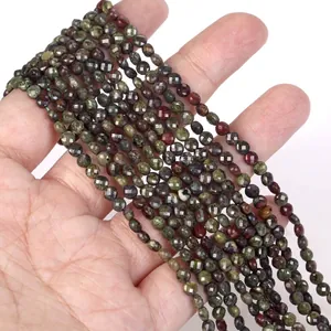 Detail shot of faceted 4mm natural stone rondelle beads for handmade DIY jewelry making.
