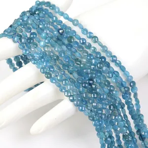 Macro detail of 4mm faceted blue natural stone rondelle beads for DIY jewelry making