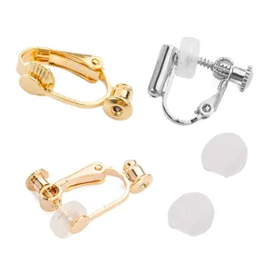 Detailed view of gold and silver plated copper screw earring converters with comfort pads