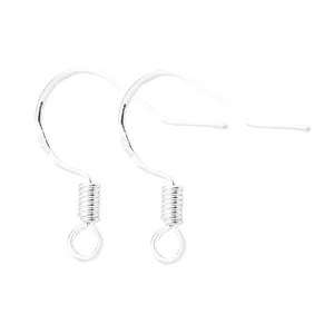 Macro view of silver-plated copper earring hooks featuring delicate coil and open loop