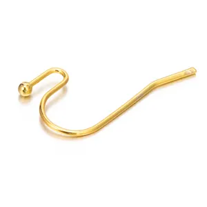 Close-up detail of a gold-plated French earring hook with a small decorative ball end