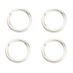 Detailed view of silver-plated copper jump rings for DIY jewelry making and repair.