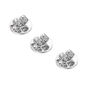 Macro view of high-quality silver-plated circular earring backs for DIY earring making