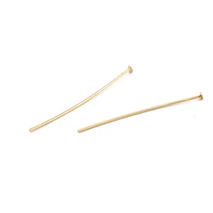 Macro view of 18K gold-plated brass T-head pins for DIY handmade jewelry accessories