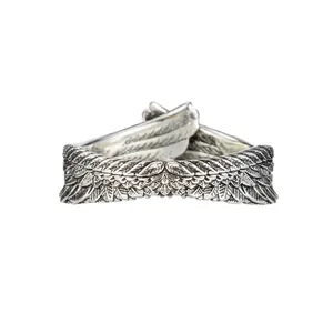 Detailed vintage punk style dragon wing ring with a textured antique silver finish