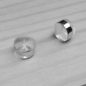 Close-up detail showing the structure of clear silicone earring backs with silver decorative ring