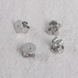 Set of silver plated 925 stamped butterfly earring backs featuring flat round plate design