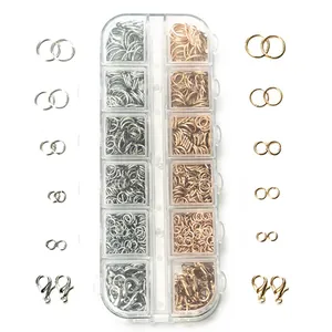 Detailed view of jewelry kit with gold and silver jump rings and lobster clasps