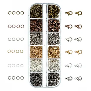 Detailed view of DIY jewelry kit with multi-color lobster clasps and jump rings in a box.