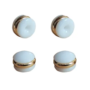 Set of 4 silicone hamburger style earring backs with gold plated rings for DIY jewelry