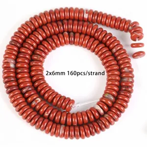 Detailed view of 2x6mm red jasper natural stone spacer beads for DIY jewelry making