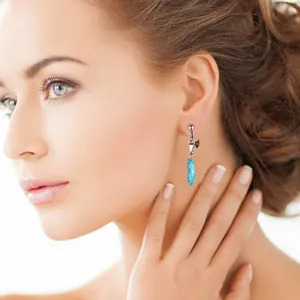 Close-up showing the effect of a French clip-on earring converter on a model