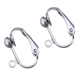 Macro detail view of silver French style DIY ear clip converters for handmade earrings