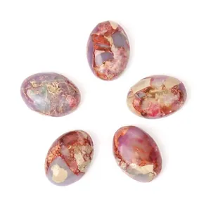 Vue macro de pierres de jaspe impérial ovales 10x14mm pour la création de bijoux DIY