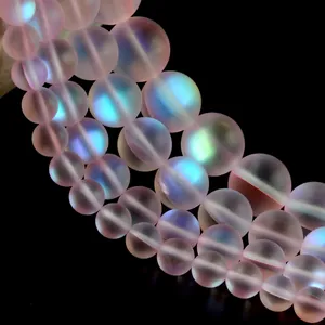 Macro detail showing the frosted texture and iridescent glow of pink stone beads