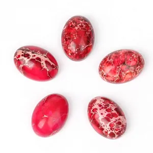 Vue détaillée de haute qualité de cabochons ovales en turquoise impériale rouge pour bijoux