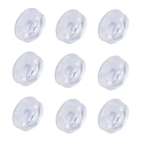 Set of nine clear silicone anti-pain cushions for screw-back earrings and clips