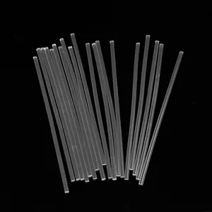 High viscosity transparent 7mm hot melt glue sticks for DIY arts and crafts on black background