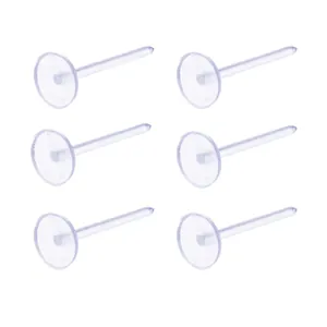 Detailed view of transparent plastic flat base earring pins for DIY jewelry making