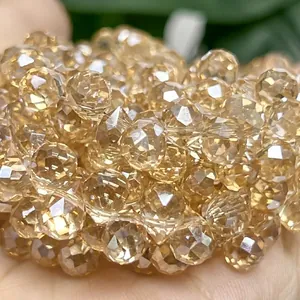 Macro detail of 6mm faceted amber crystal beads for DIY jewelry making accessories