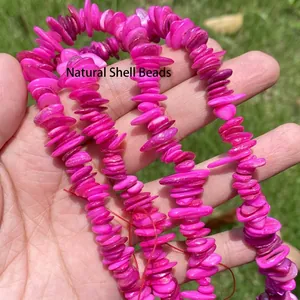 Close-up of vibrant fuchsia shell chip beads for DIY Bohemian jewelry making