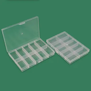 Detailed view of clear 10-compartment plastic organizer boxes with snap-on lids