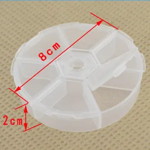 Transparent circular 7-compartment plastic storage box showing 8cm diameter and 2cm height