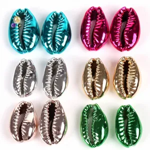 Collection of metallic electroplated cowrie shell beads in assorted vibrant colors