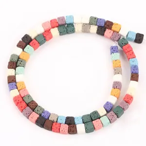 Macro view of 4x4mm colorful square lava stone beads for DIY jewelry making
