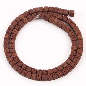 Close-up detail of 4x4mm brown square lava stone beads for DIY craft jewelry making.