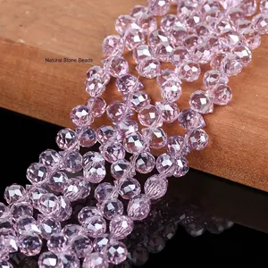 Macro view showing the sparkling facets of 6mm pink crystal beads for DIY jewelry making