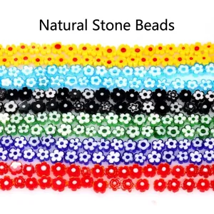 Detailed macro shot of 8mm colorful flower-shaped millefiori glass beads for DIY jewelry making