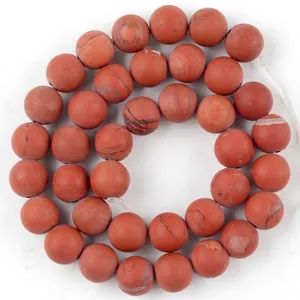 Macro view of 10mm natural red jasper stone beads for DIY jewelry making accessories
