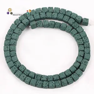 Close-up of 4x4mm square green volcanic lava stone beads for DIY jewelry making.