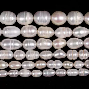 Macro detail view of natural freshwater rice pearls showing iridescent luster and texture