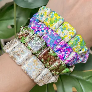 Close-up of 20mm multicolor square turquoise beads for jewelry making