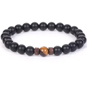 Bracelet minimaliste fait main en perles de pierre noire mate avec œil de tigre