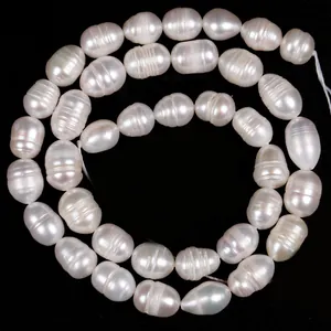 Detailed macro view of white ringed freshwater rice pearls for DIY jewelry making