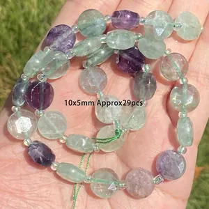 Macro detail of faceted natural colorful fluorite beads for DIY jewelry making